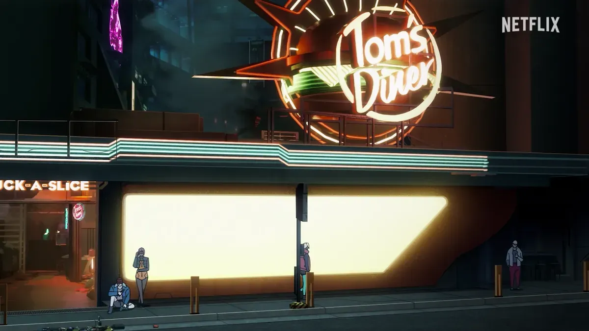Fotograma de un bar con un cartel de neón en Night City